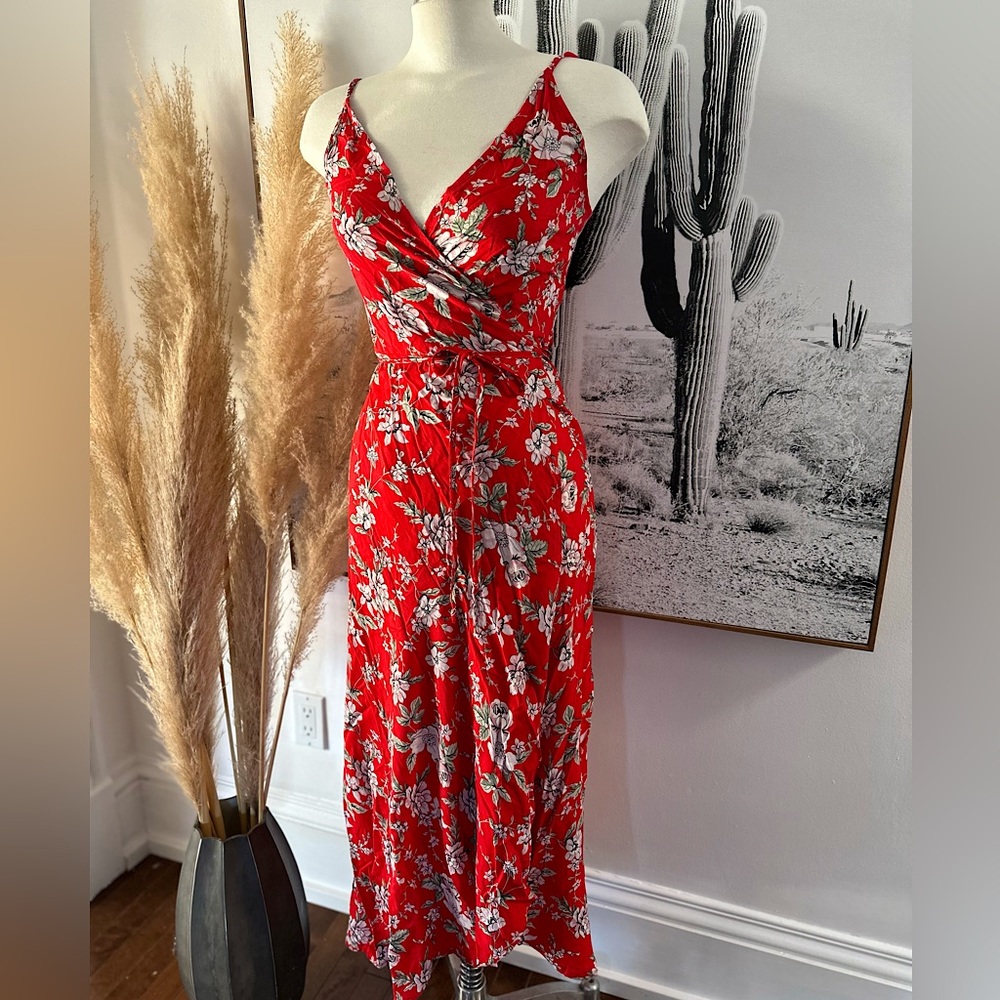 True wrap dress with adjustable straps in a size medium.